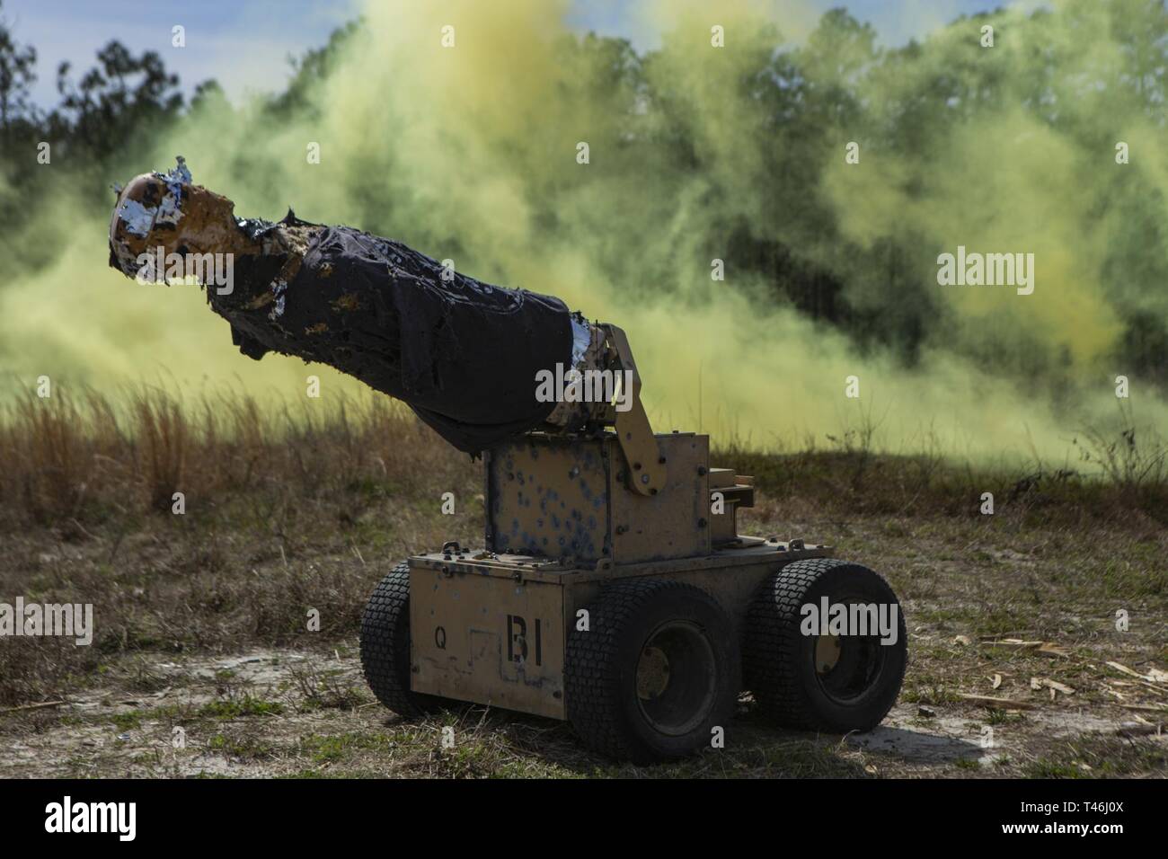 An autonomous target is suppressed by U.S. Marines with 2nd Combat Engineer Battalion, 2nd Marine Division, while conducting breaching operations during the annual SAPPER Squad Competition on Camp Lejeune, North Carolina, March 12, 2019. Marines from four squads compete against each other for a week to test their strengths within the occupational field and build camaraderie while maintaining mission readiness. Stock Photo