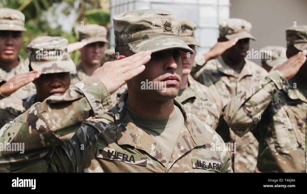U.S. Army Staff Sgt. David Viera of the 561st Engineer Construction Company, 84th Engineer Battalion, 130th Engineer Brigade, 8th Theater Sustainment Command, leads his platoon during the playing of the National Anthem at the Engineering Civic Action Project 4 opening ceremony as part of Exercise Balikatan, March 12, 2019. Exercise Balikatan, in its 35th iteration, is an annual U.S.-Philippine military training exercise focused on a variety of missions, including humanitarian assistance and disaster relief, counter-terrorism, and other combined military operations. The U.S. military is committ Stock Photo