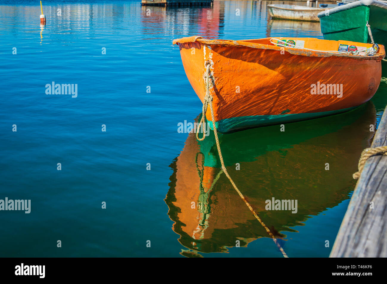 Fishing boat tied to pier hi-res stock photography and images - Alamy