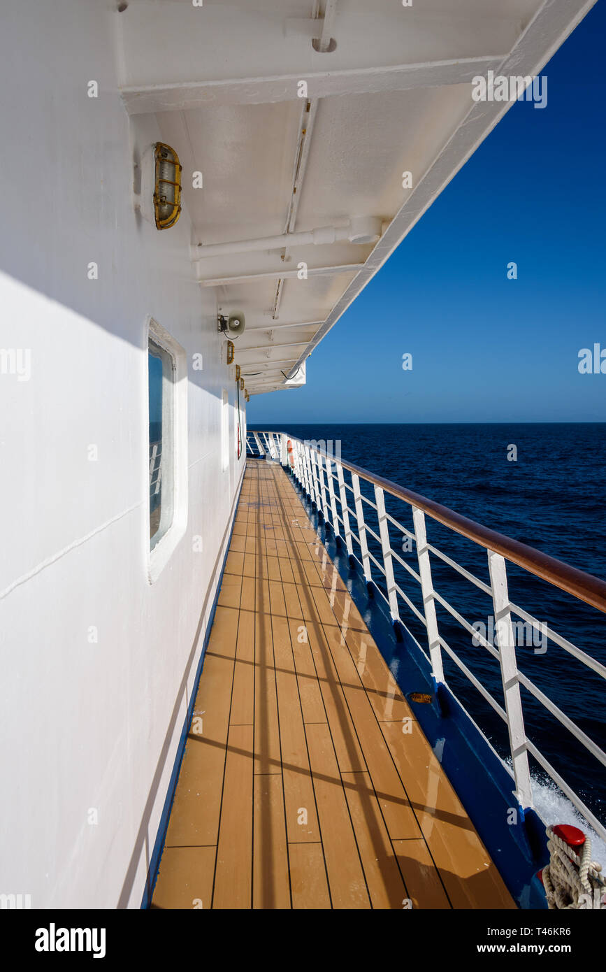 View of blue sky and blue ocean on sunny day from outside deck of ...