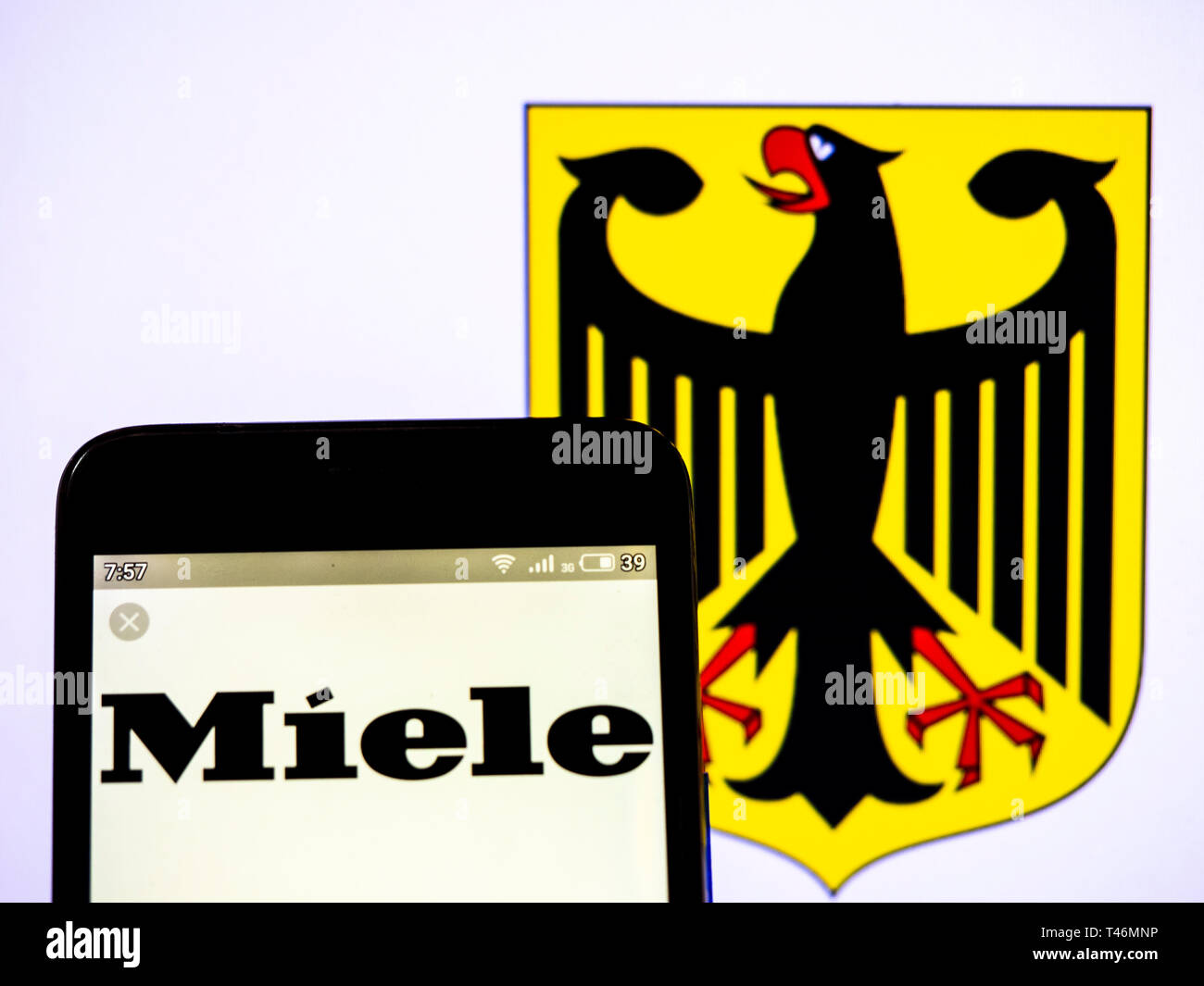 In this photo illustration a Miele & Cie. KG logo seen displayed on a ...