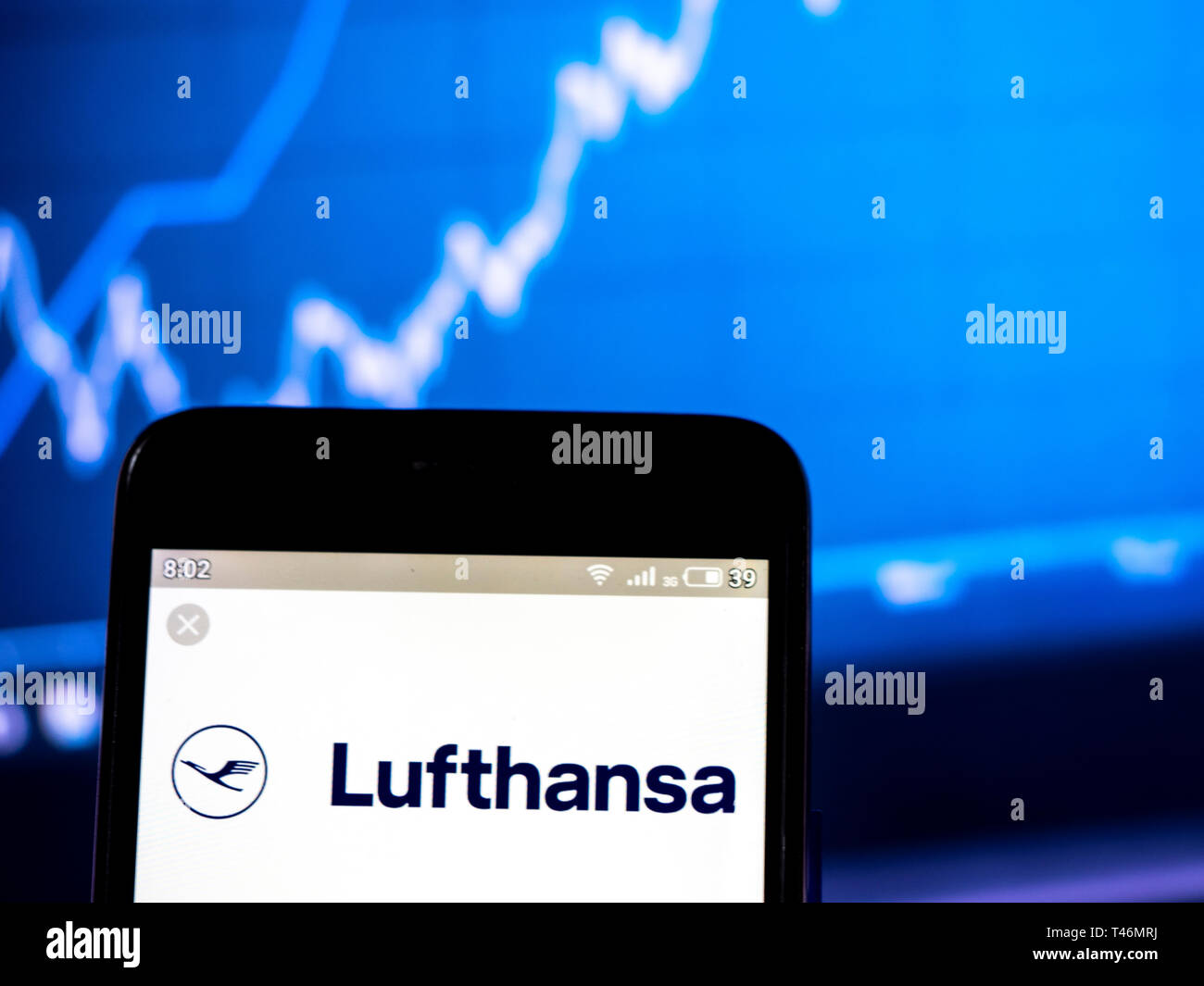 In this photo illustration a Deutsche Lufthansa AG logo seen displayed on a smart phone Stock
