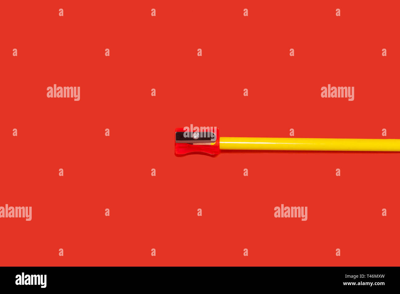 yellow pencil with sharpener on it Stock Photo