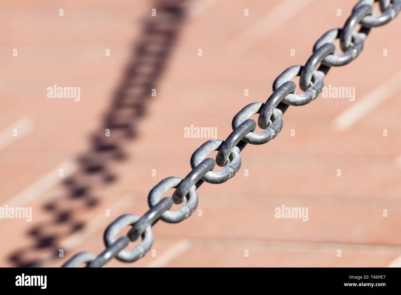 https://c8.alamy.com/comp/T46PE7/old-metal-chain-on-background-with-shadow-T46PE7.jpg