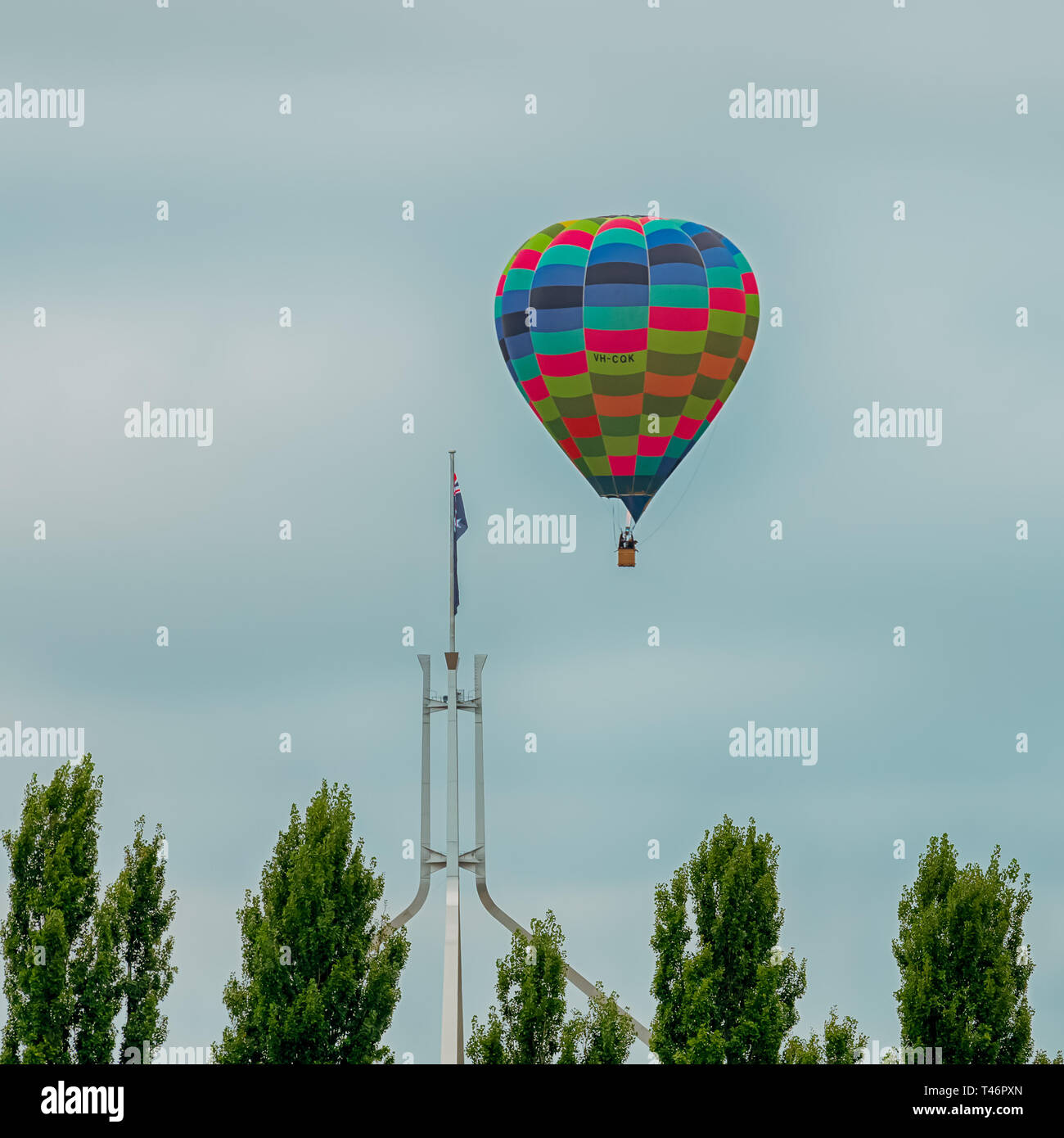 Canberra, Australia, March 13th, 2019 hot air balloon passing over capital hill during the annual balloon festival. Stock Photo