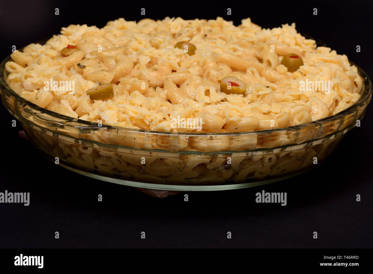 isolated dish of pasta on black background Stock Photo