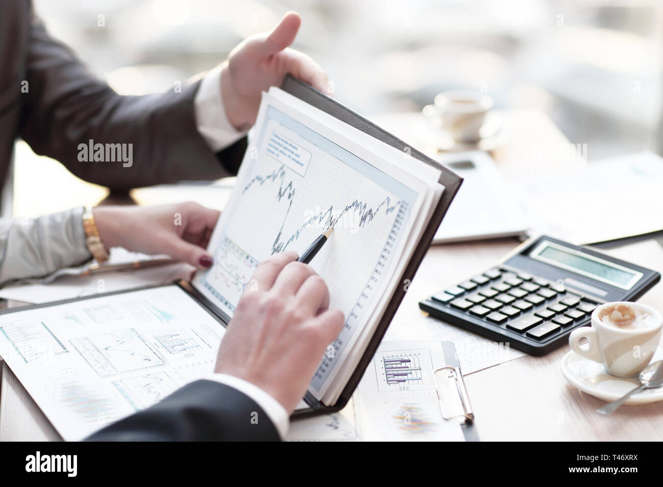 close up. colleagues discuss financial schedule Stock Photo