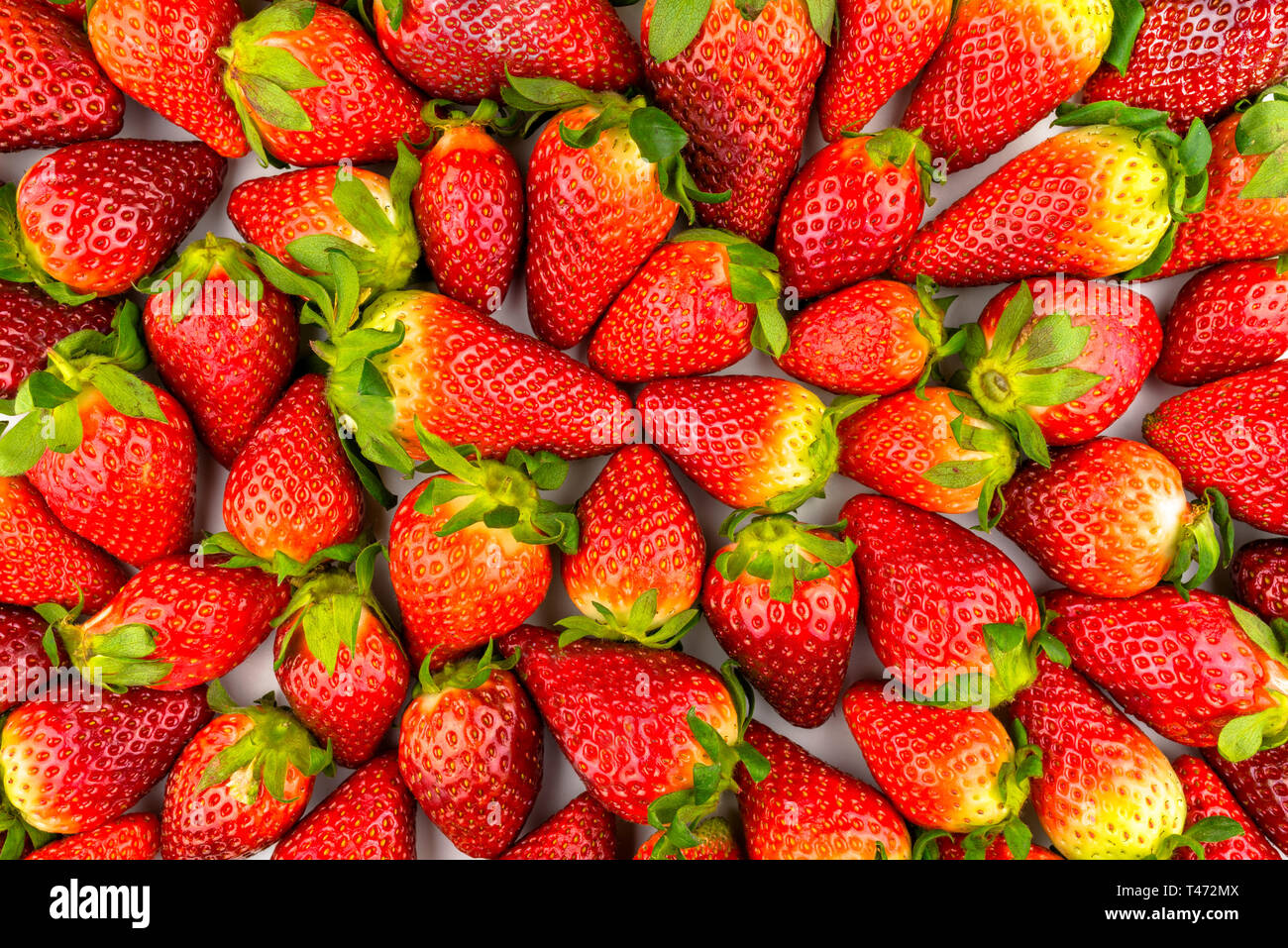 Pattern made from fresh strawberries, top view, flat lay pattern. Stock Photo