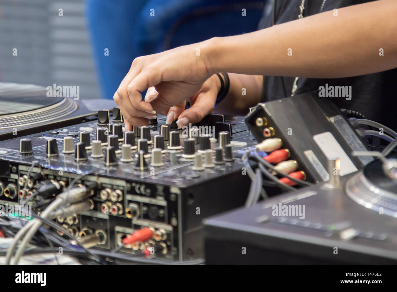 female hand playing DJ mixer Stock Photo Alamy