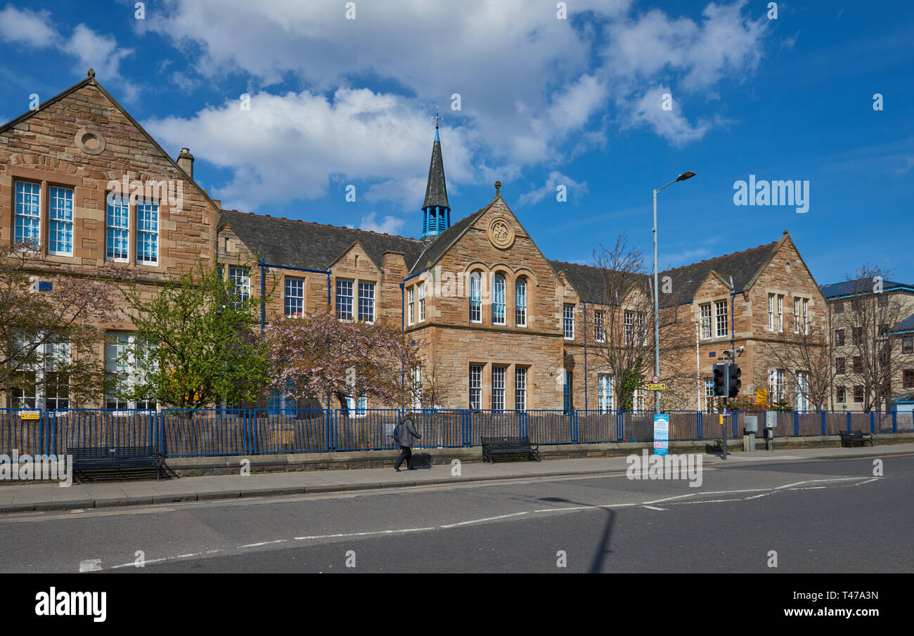 The front ,and entrance of the Victorian built Dalry Primary School, off Dalry Road in Edinburgh on a bright Spring morning in April, Scotland. Stock Photo