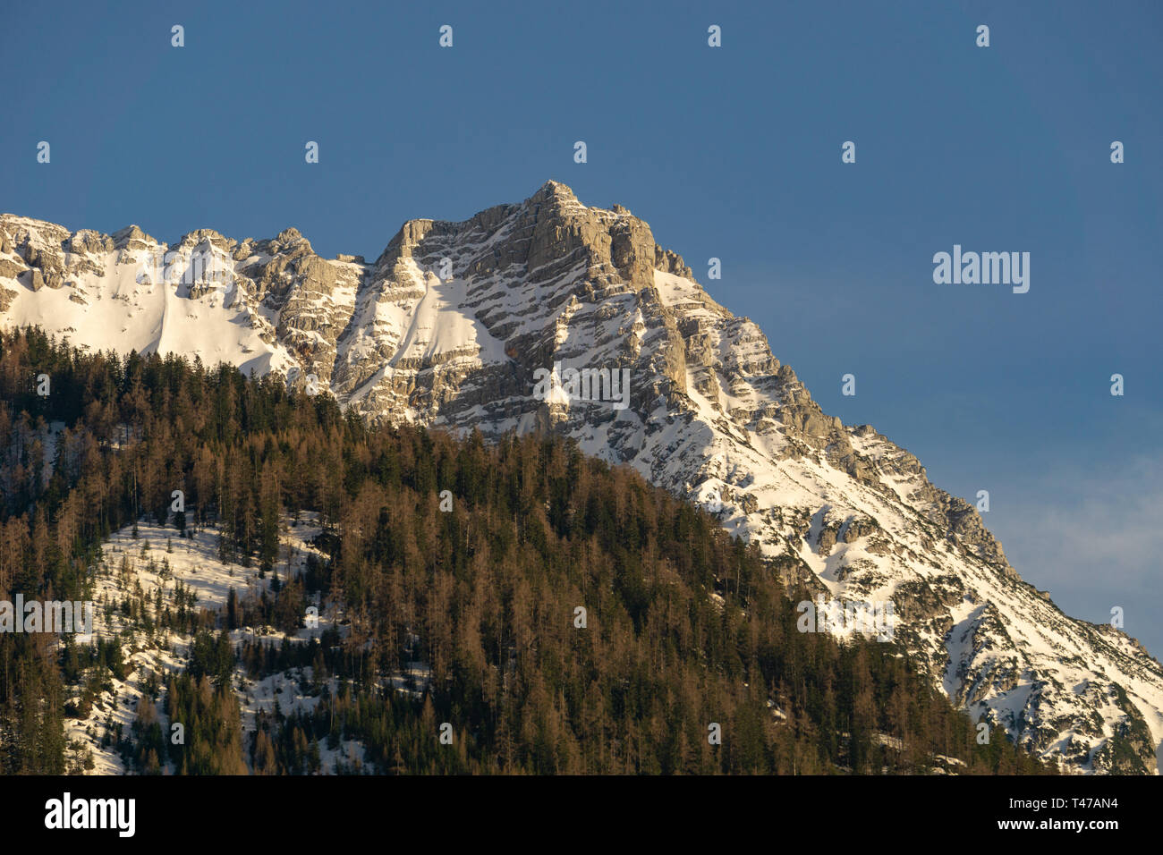 Mountain peak in the blue sky Stock Photo Alamy