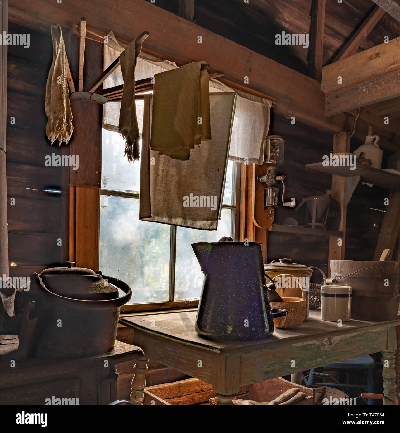 Rustic Kitchen with Antique Items by Window Stock Photo - Alamy