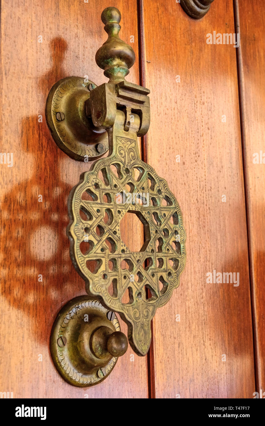 Cartagena Colombia,ornamental door knocker,brass,wooden door