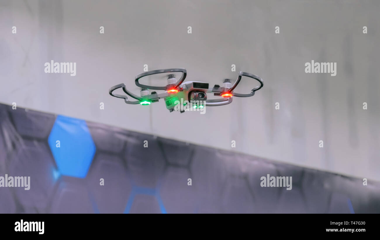 Drone with red light flying indoor Stock Photo Alamy