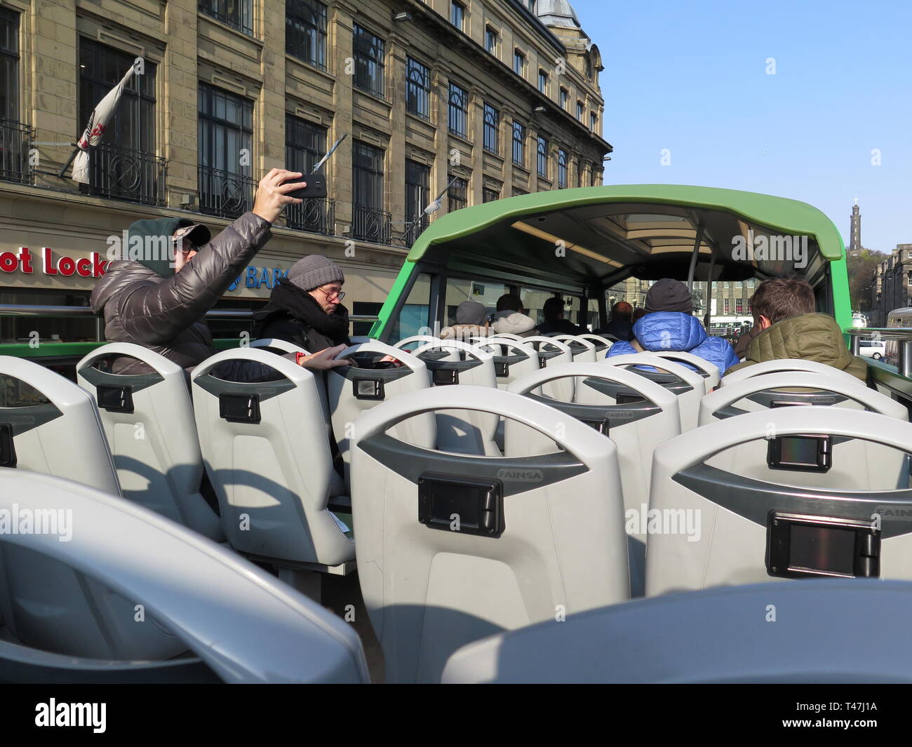Tour bus on street hi-res stock photography and images - Alamy