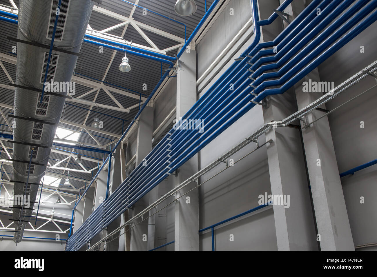 Internal space of the waste sorting plant. Recycling and storage of waste for further disposal. Stock Photo