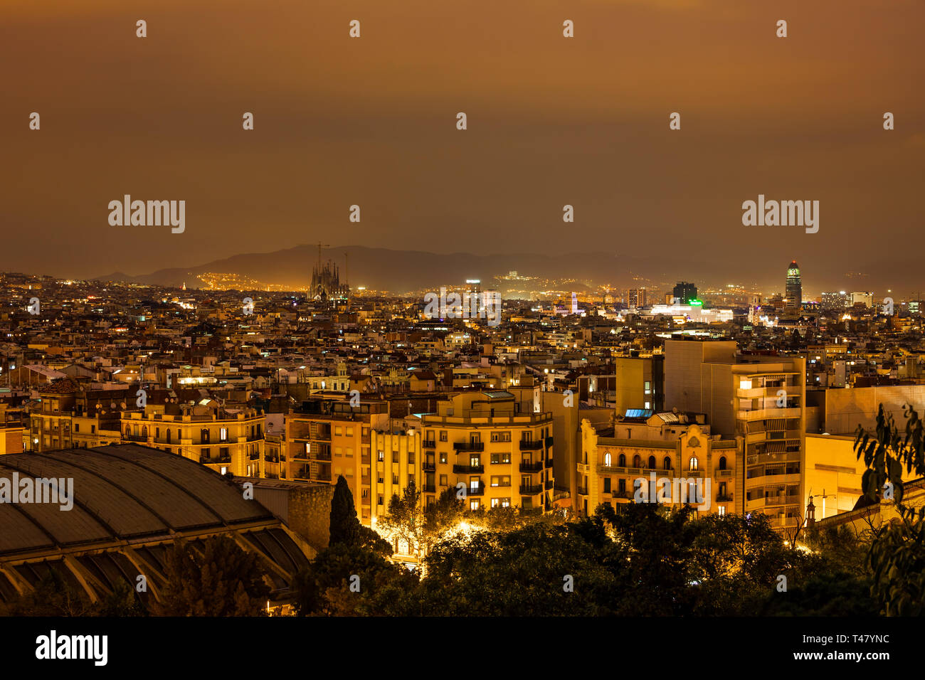 City of Barcelona sepia tone night cityscape from Poble Sec district, Catalonia, Spain Stock Photo