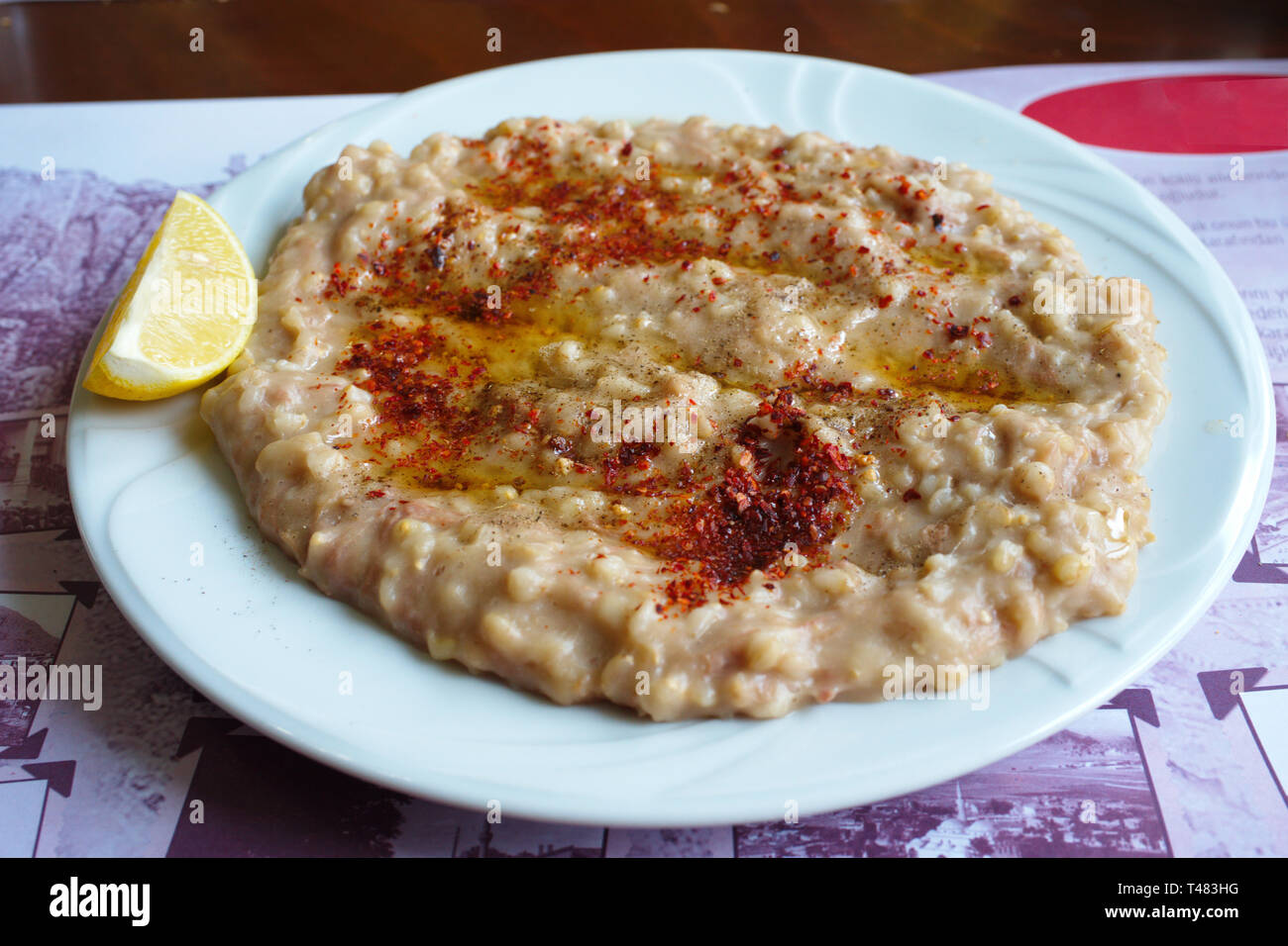 'keşkek' . a traditional Turkish dish made of wheat, chickpeas, beans and meat. It is usually made at weddings and feasts Stock Photo