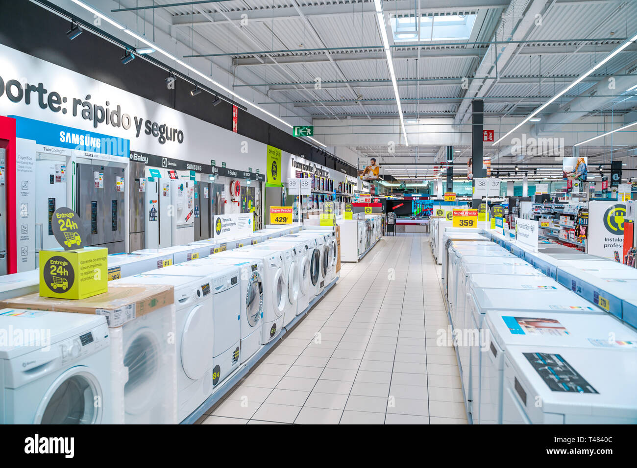 Valencia,Spain - April 03, 2019: Washing Machines, drying  machines,household appliances department. Carrefour supermarket Stock Photo  - Alamy