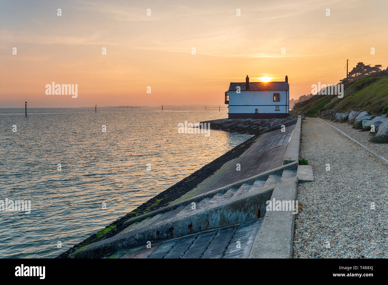A cottage on the beach at Lepe on the edge of the New Forest on the Hampshire coast Stock Photo