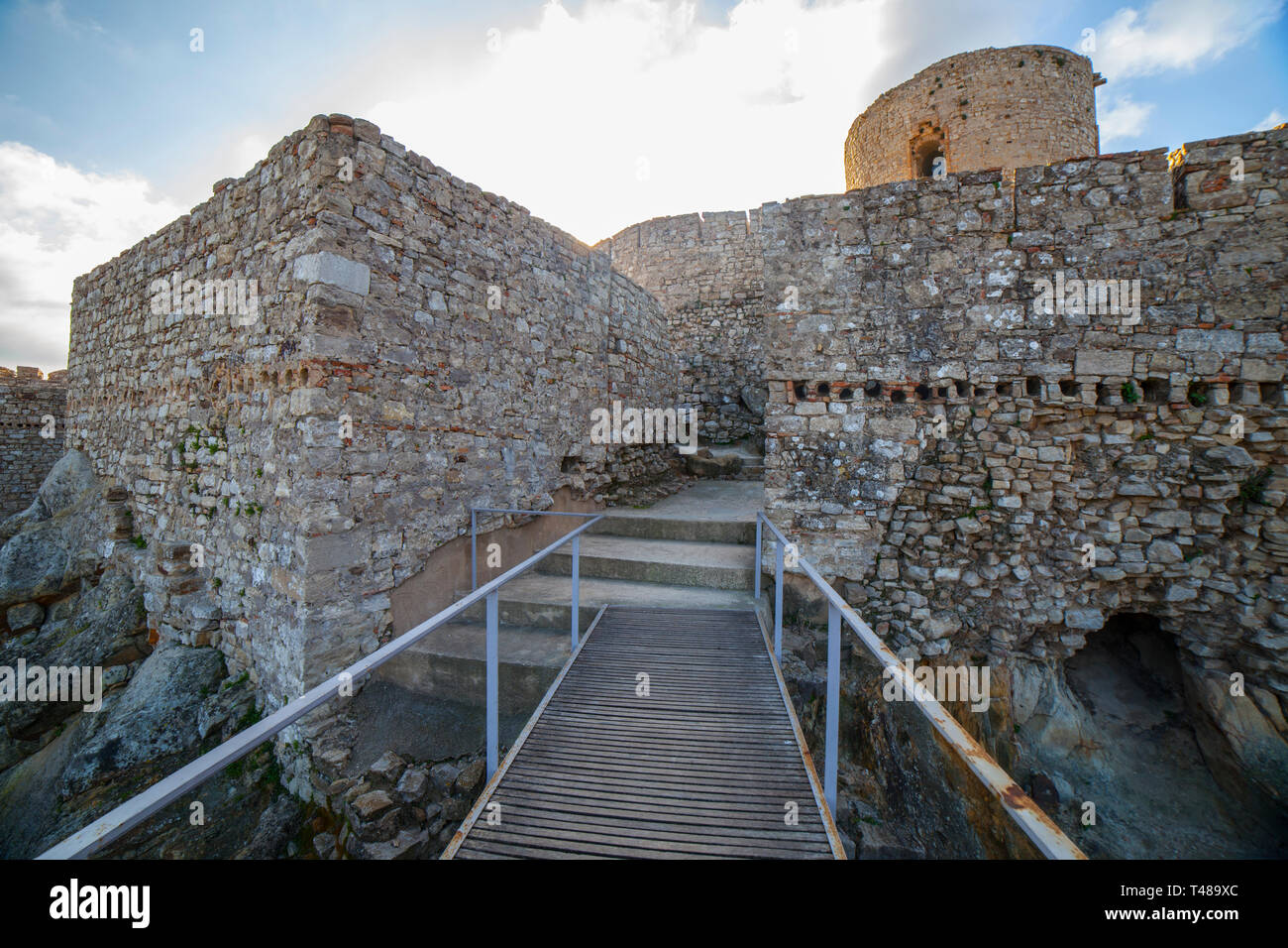 Castle of Jimena de la Frontera, Cadiz, Spain. Christian Alcazar moat footbridge Stock Photo
