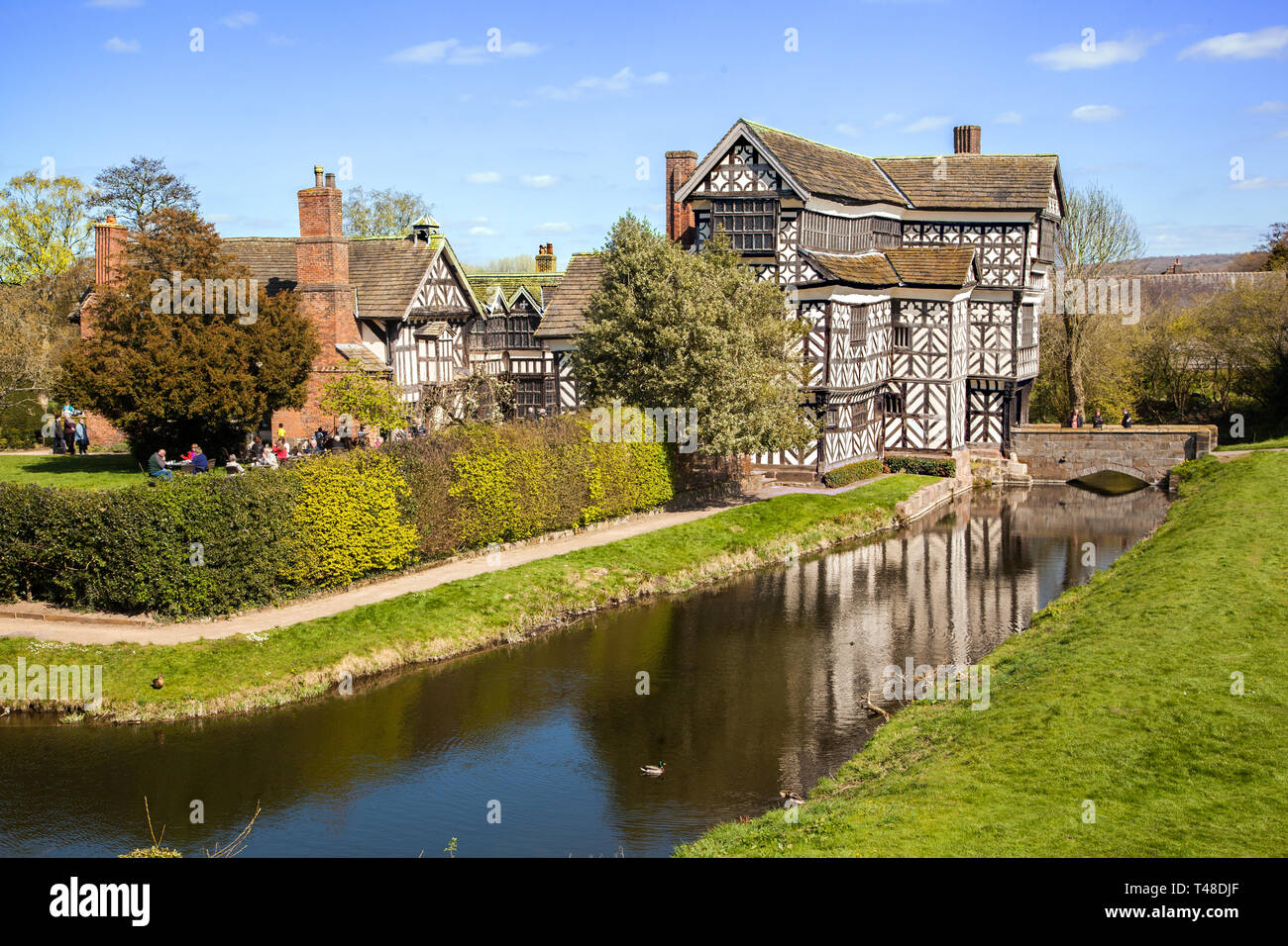 Little Moreton Hall, moated black and white half timbered Tudor manor house near Congleton in Cheshire, owned by the national trust Stock Photo