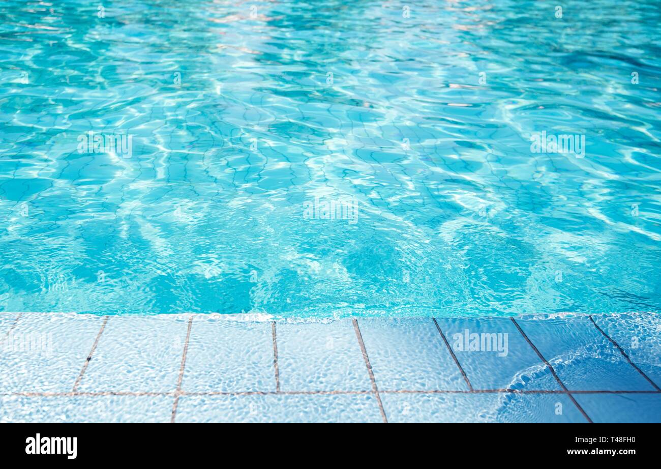 Swimming Pool Edge. Blue Ceramic Tiles. Sport and Recreation Theme