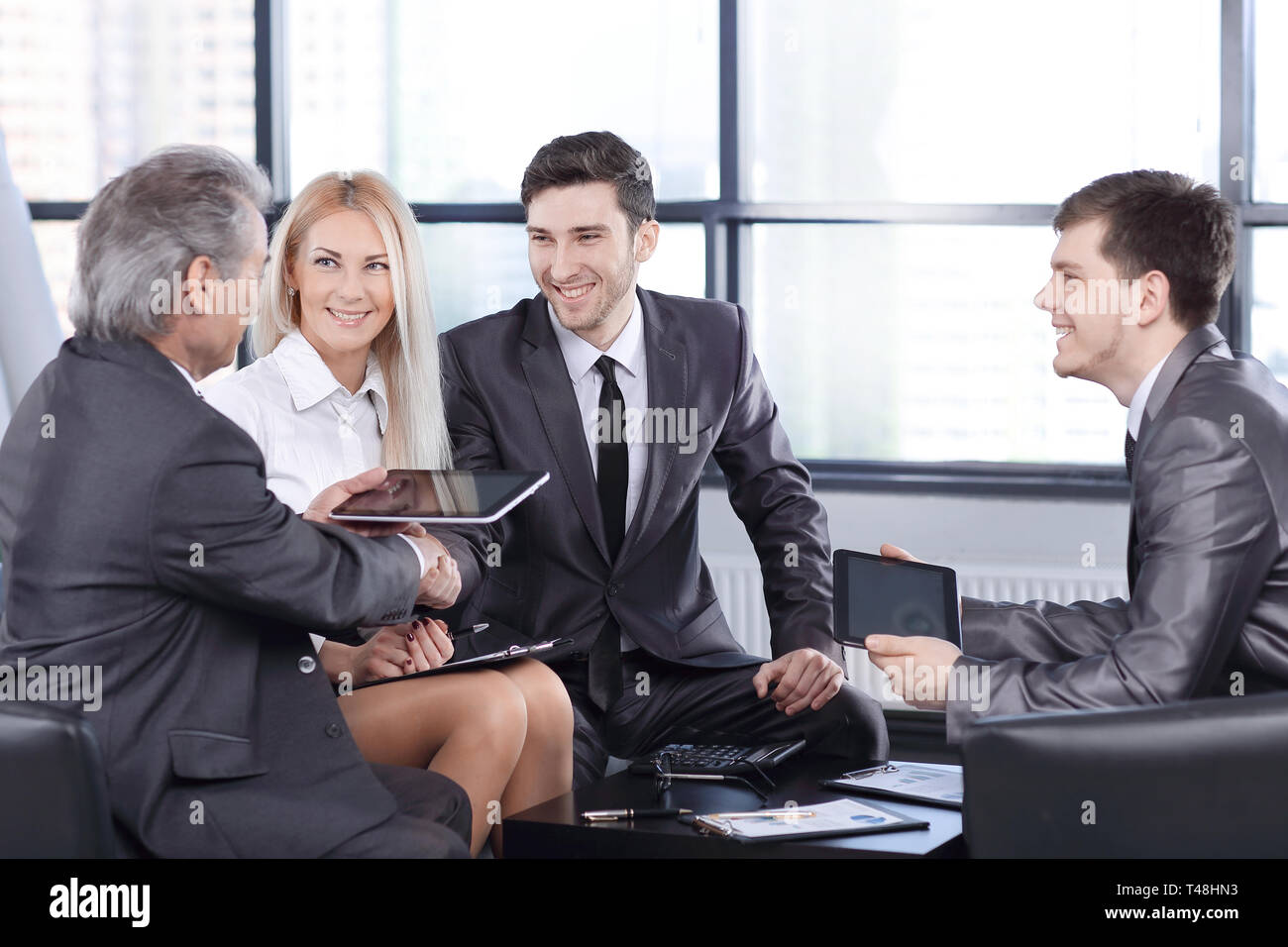 business partners approving the transaction with a handshake .the ...