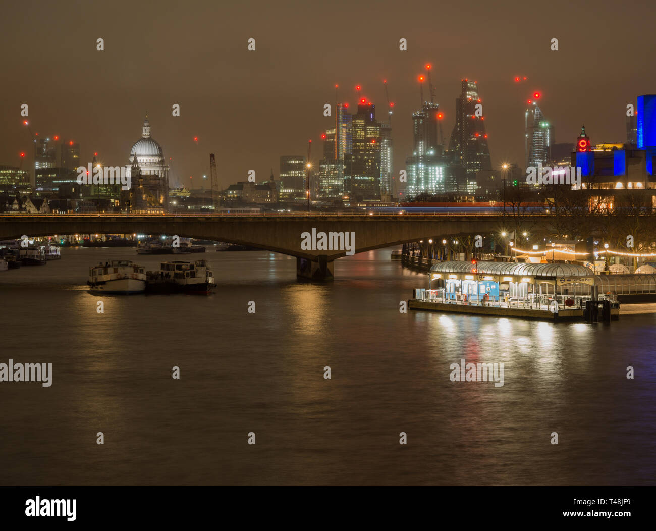London at night: A view of the Thames including Waterloo Bridge, St. Paul's Cathedral and the London skyline Stock Photo