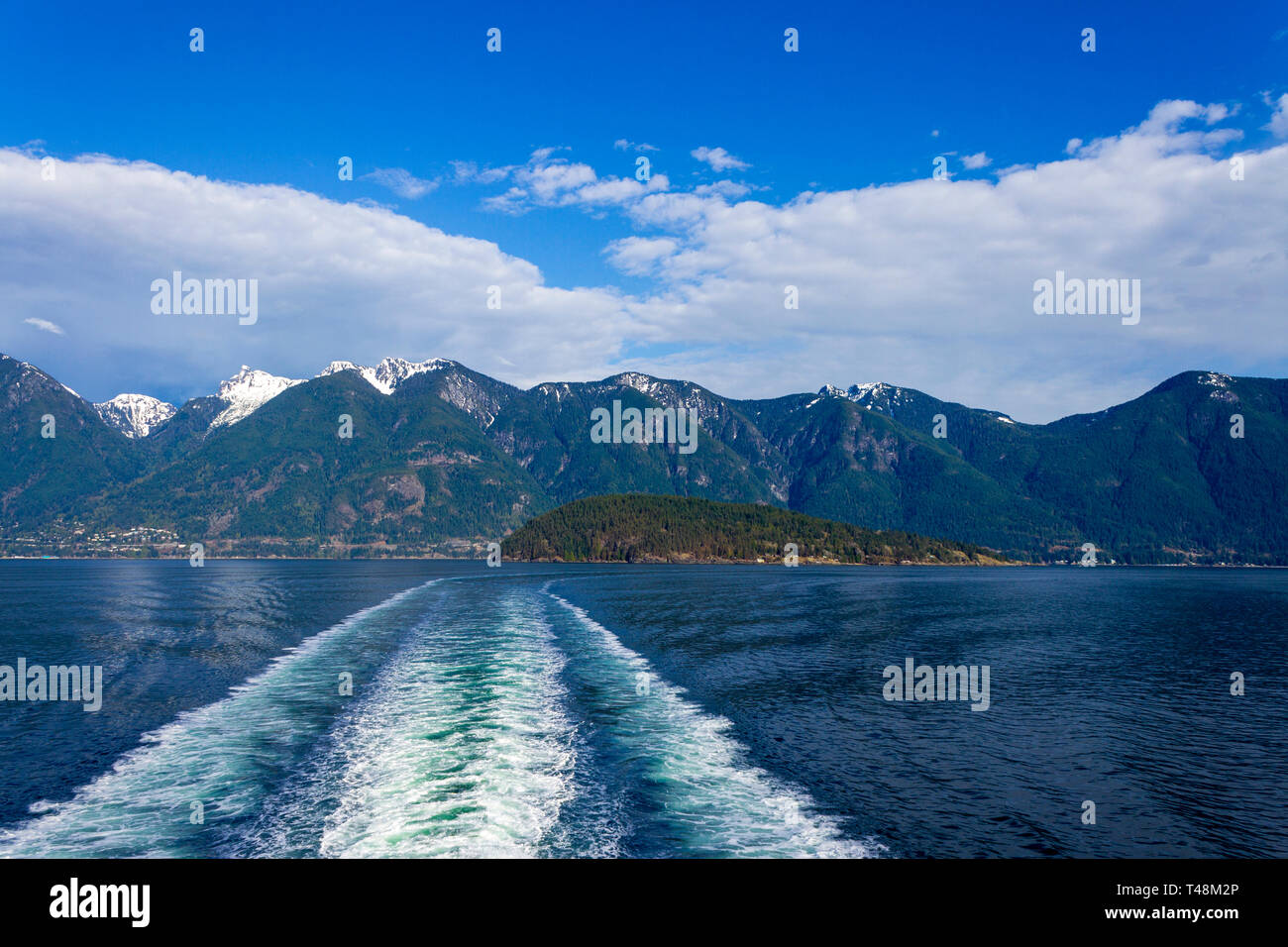 Wake in Howe Sound from behind a BC Ferry traveling from Horseshoe Bay to Langdale on the Sunshine Coast, British Columbia, Canada. Stock Photo