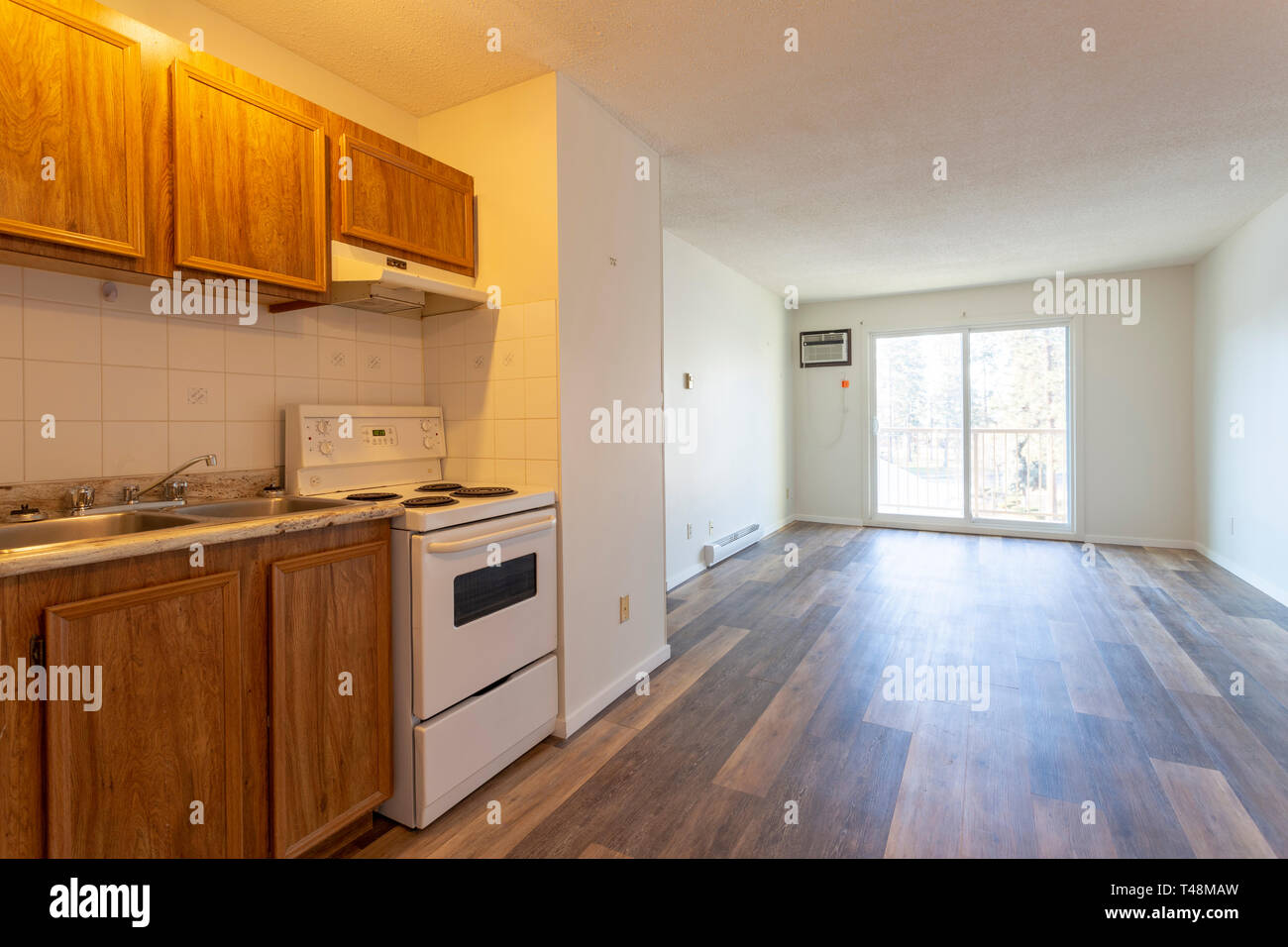 An Empty Vacant Rental Apartment Property With New Hardwood