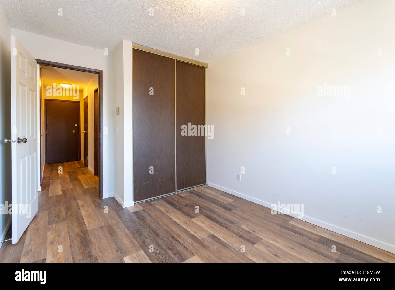 An Empty Vacant Rental Apartment Property With New Hardwood