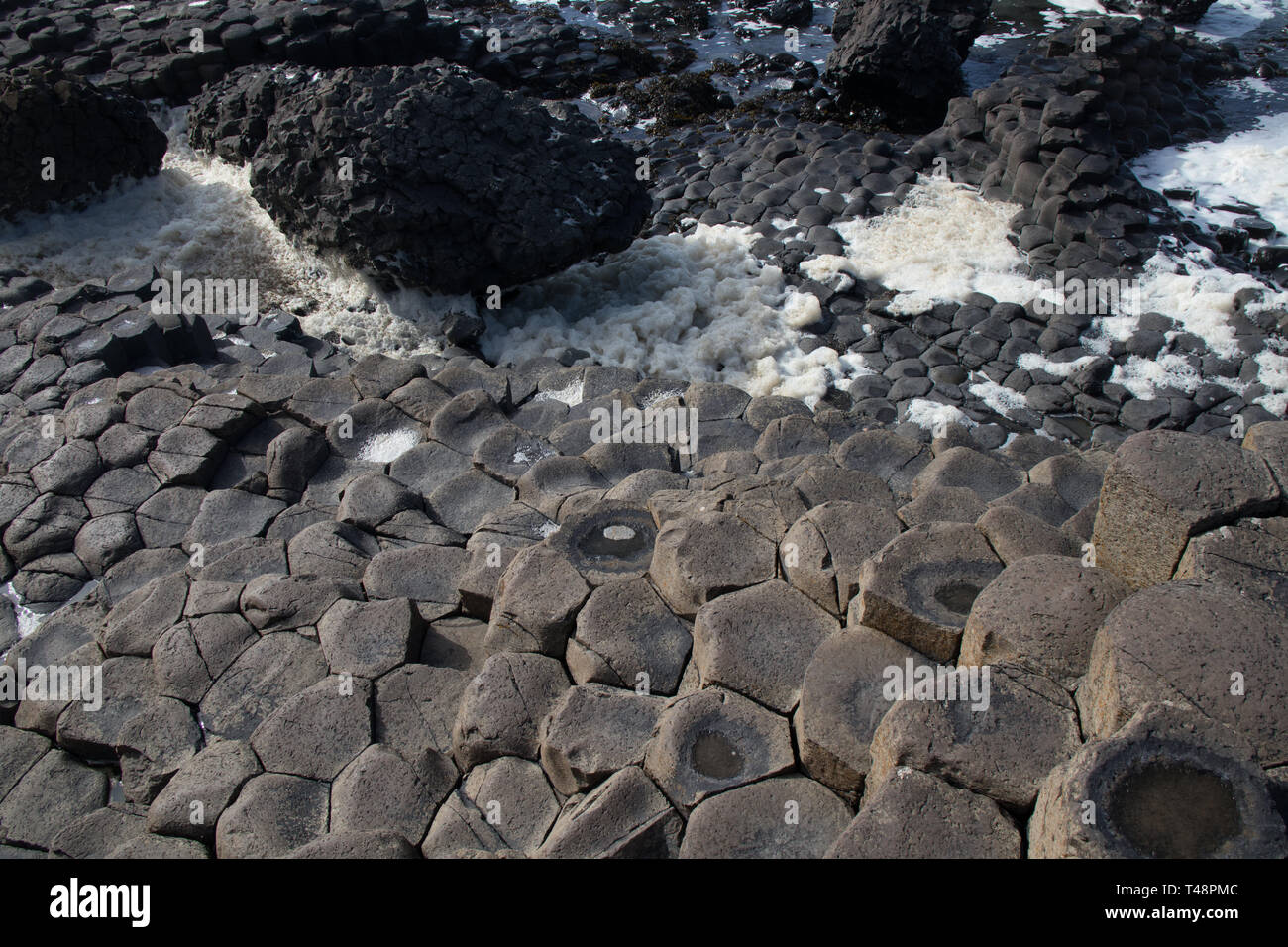 Hexagonal stones at the Giant's Causeway in Northern Ireland Stock Photo