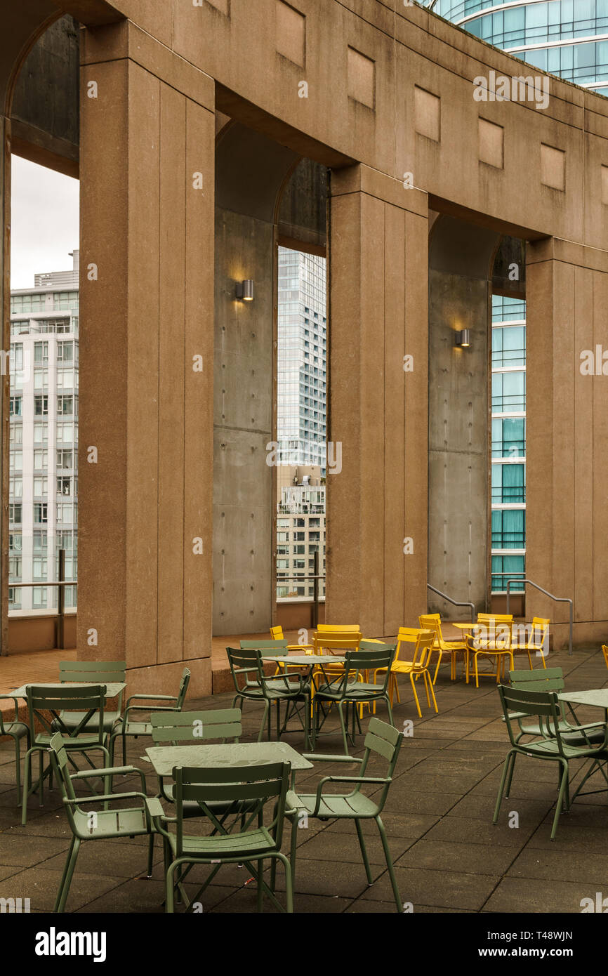 VANCOUVER, CANADA - October 5, 2018: rest zone in the central library with concrete columns armchairs and metal tables. Stock Photo