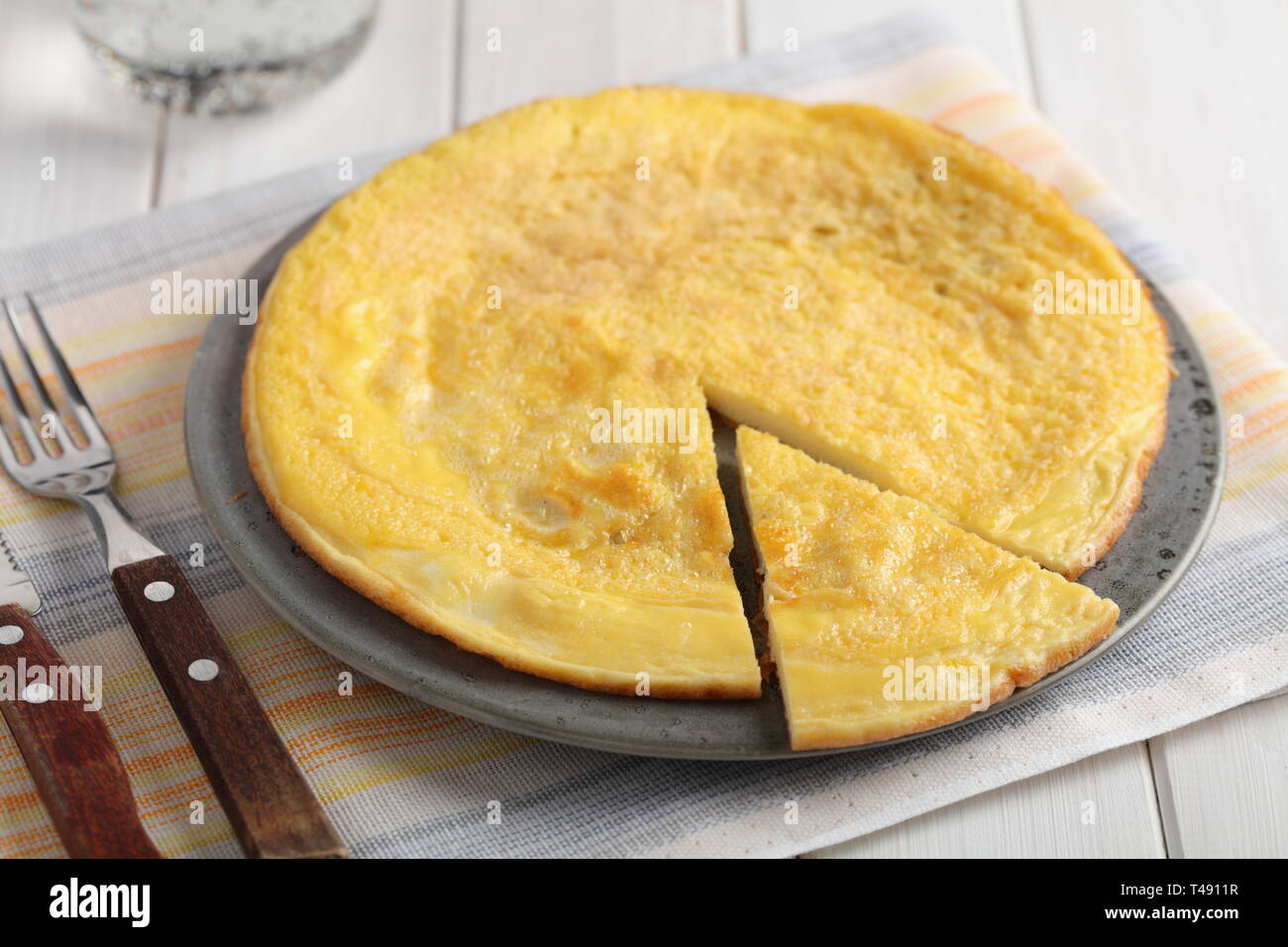 Breakfast with omelet on a rustic table Stock Photo