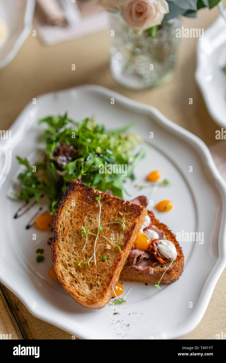 French toast brioche, Sandwich with pastrami and sundried tomatoes