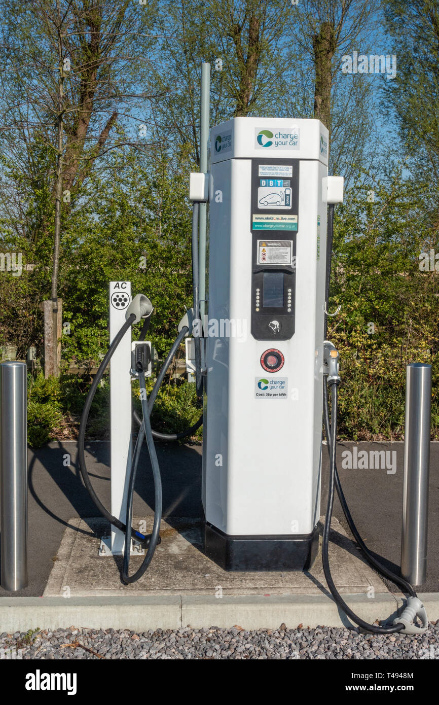 Electrical charging points to charge electric cars in Mereoak Park and Ride car park in Reading, Berkshire, UK Stock Photo