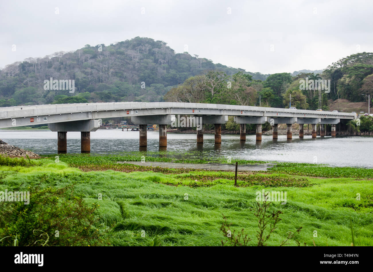 The Gamboa Bridge, the meeting place of the Chagres River and the Panama Canal. The effect of the dry season is observed on the shores and riverbed Stock Photo