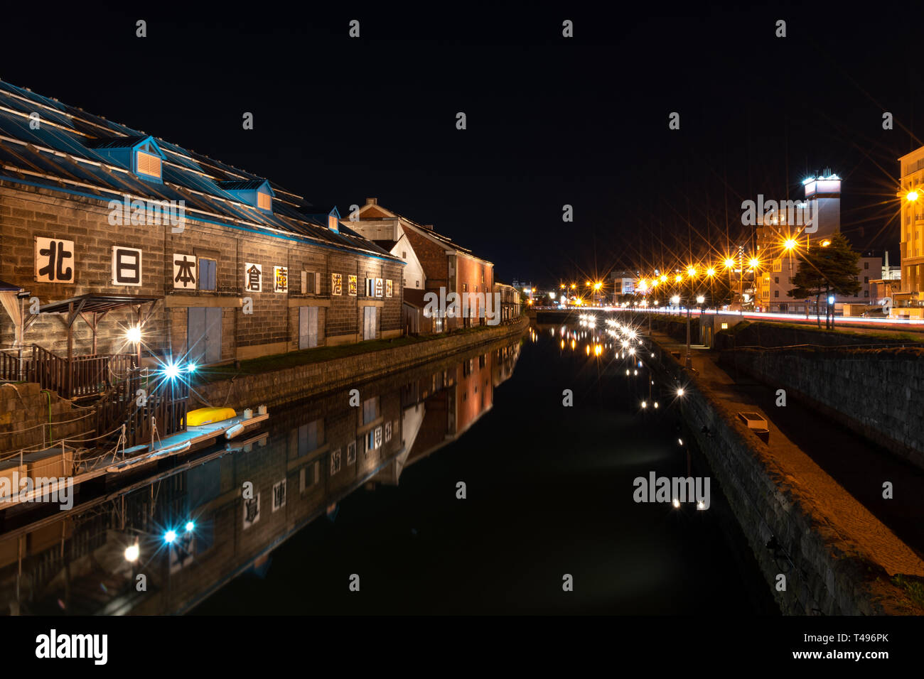 Landscape view of Otaru canals and warehouse at night in Hokkaido Japan. Here is a famous landmark of Otaru city. Stock Photo