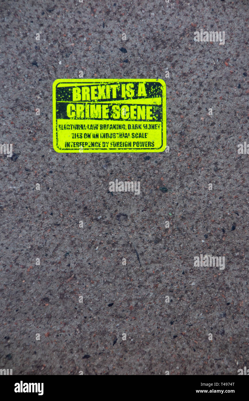 Stickers on the pavement stating that 'Brexit is a Crime Scene' following the March 2019 anti Brexit protest Stock Photo