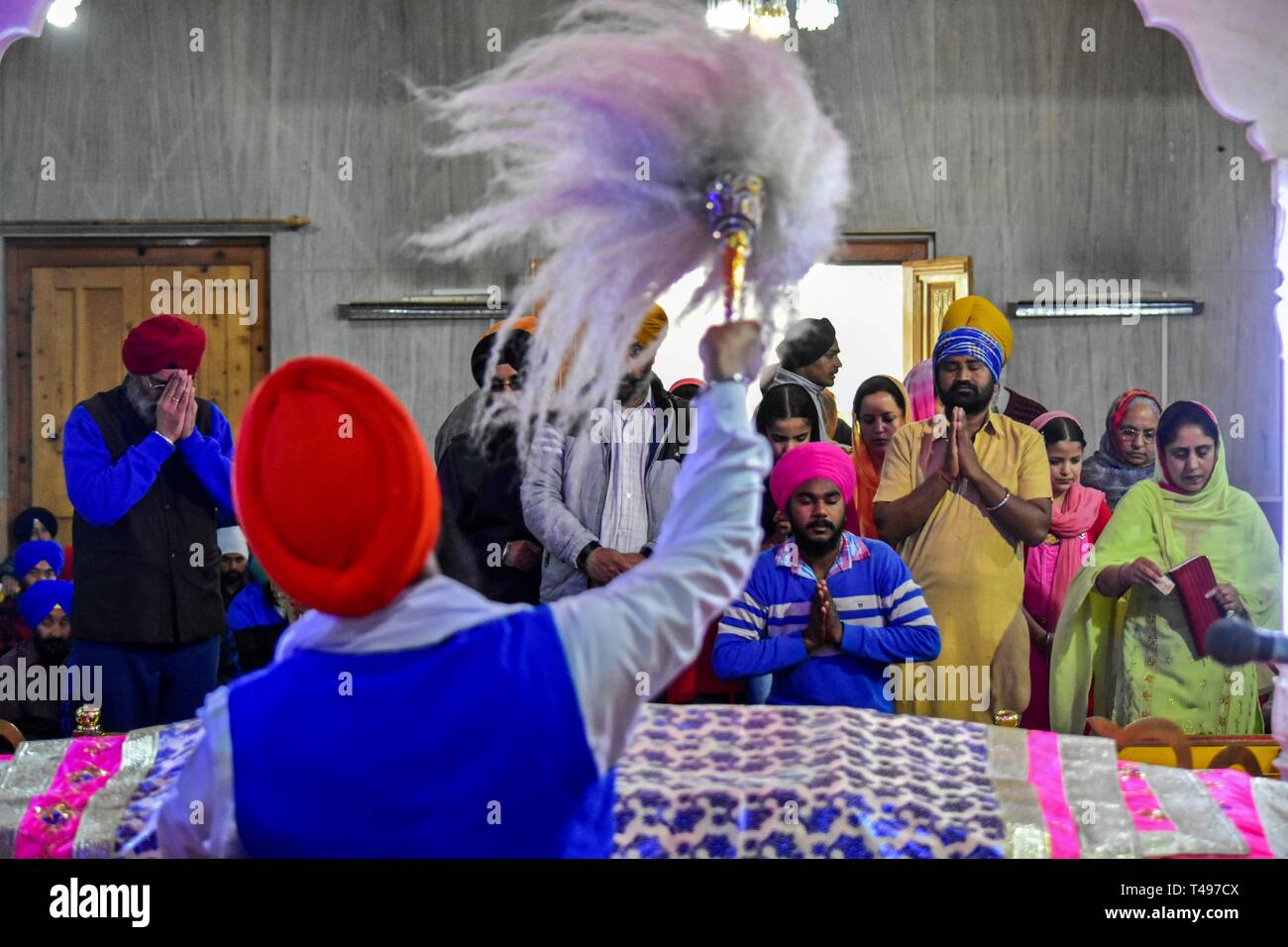 Sikh devotees seen praying inside the gurdwara or a Sikh temple during