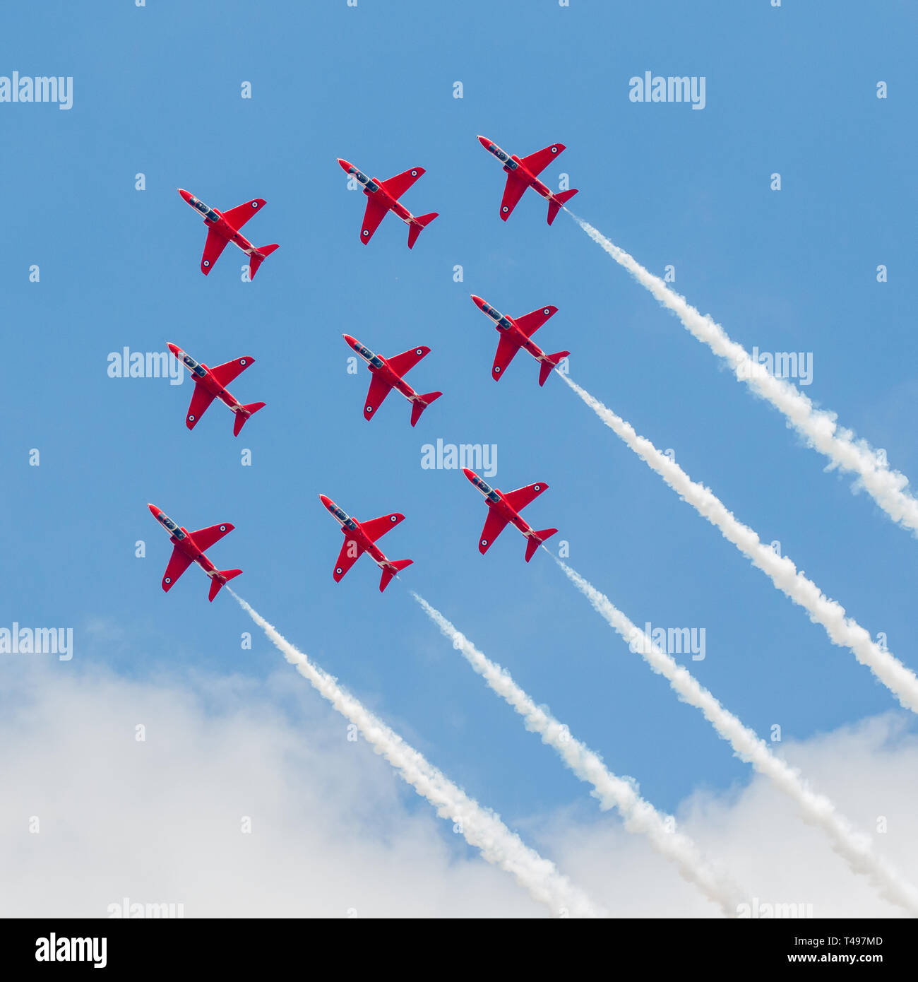 The UK Royal Air Force Aerobatic Display Team - The Red Arrows - during their display routine Stock Photo