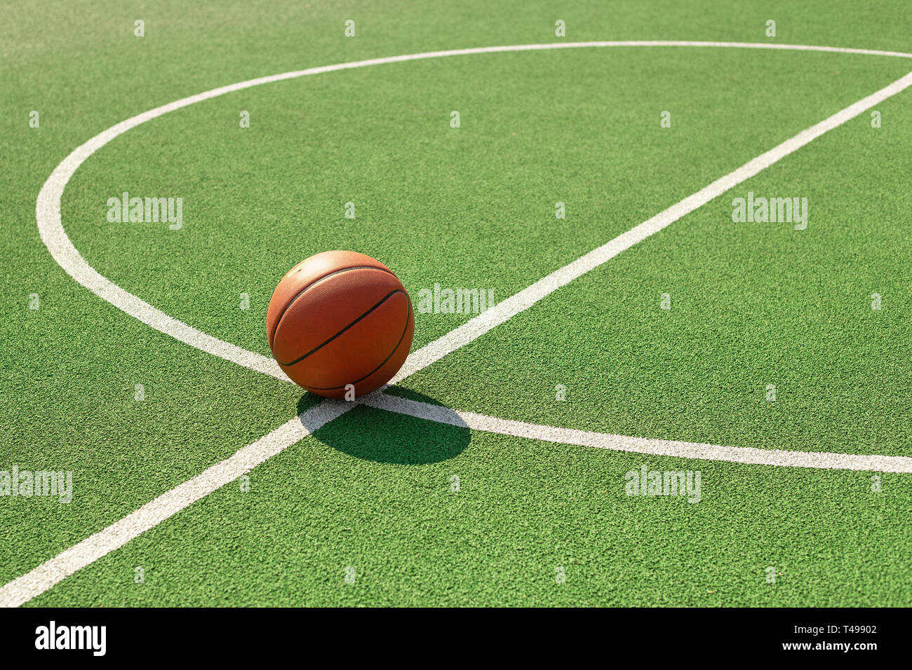 basketball ball on the outdoors court Stock Photo Alamy