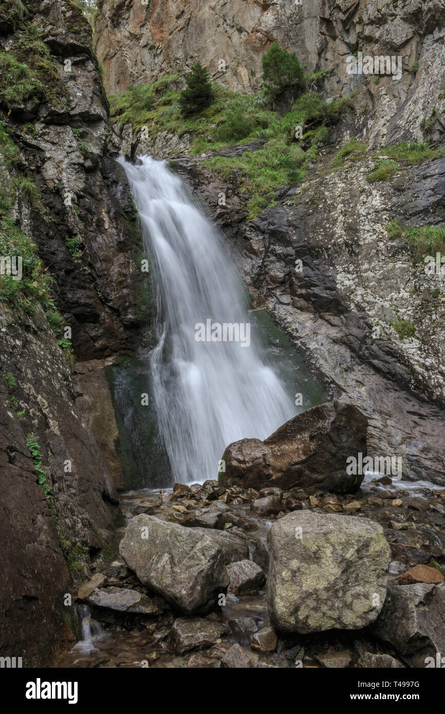 Closeup view of waterfall scenes in mountains, national park Dombay, Caucasus, Russia, Europe. Summer landscape and sunny day Stock Photo