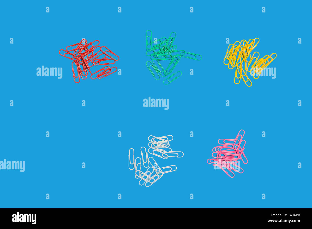 five heaps of paper clips Stock Photo