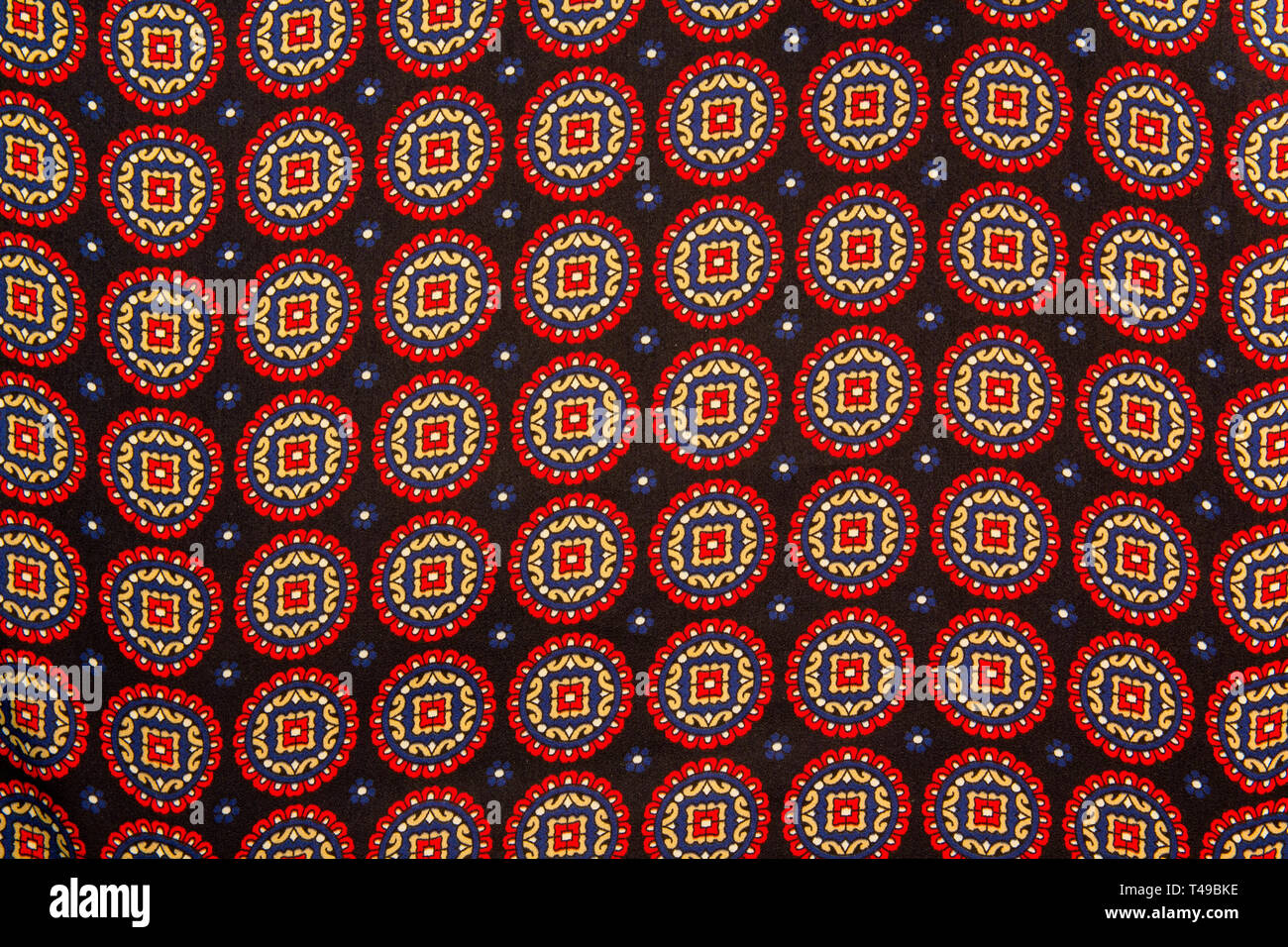 Red and blue ethnic circle pattern Stock Photo
