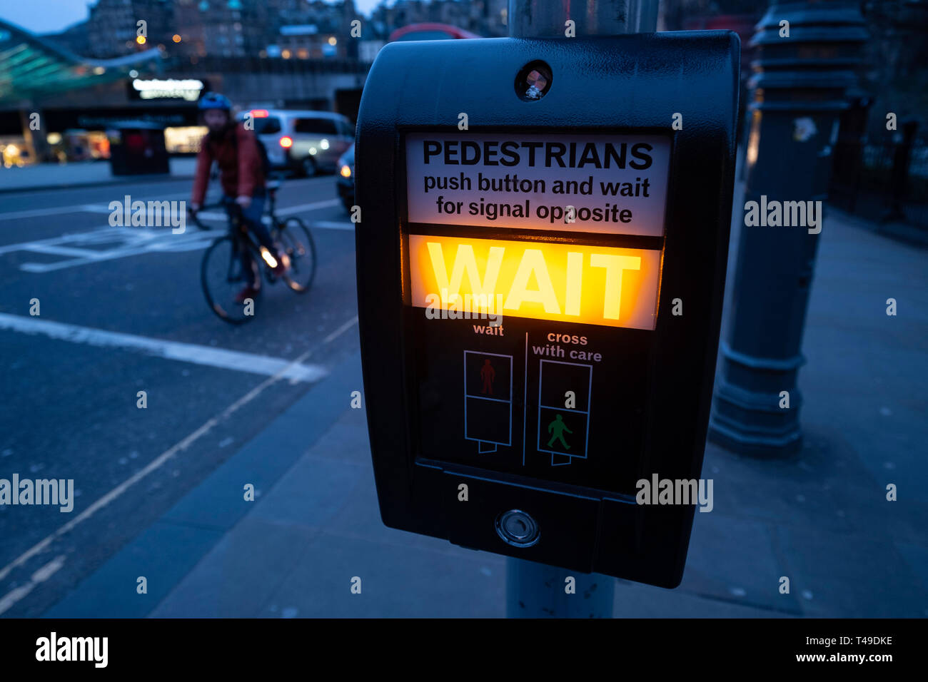 Pedestrian crossing push for green light box in Edinburgh, Scotland, UK Stock Photo