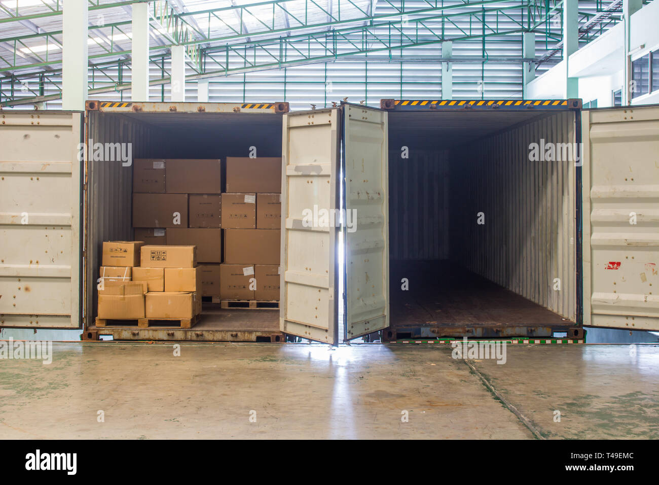The empty container inside warehouse on shipment area Stock Photo Alamy