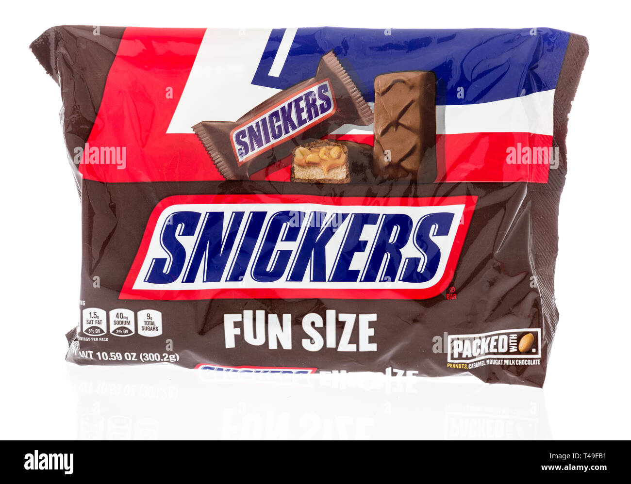 Winneconne, WI -  12 April 2019: A bag of Snickers candy bars on an isolated background Stock Photo