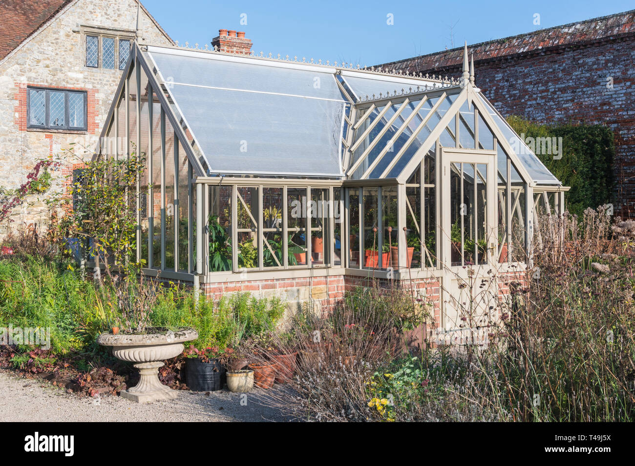 Free standing greenhouse with apex roof Stock Photo Alamy